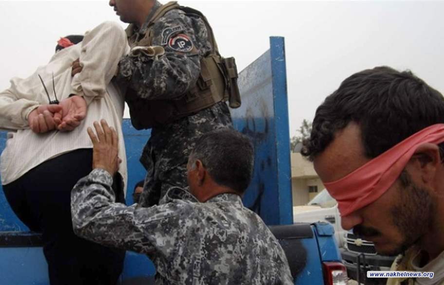 القوات الامنية تعتقل شخصين بحوزتهما حبوب مخدرة وسط بغداد